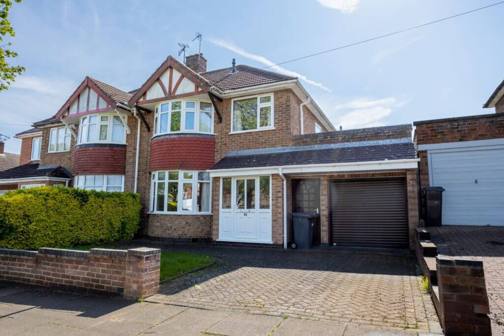 a brick house with a garage